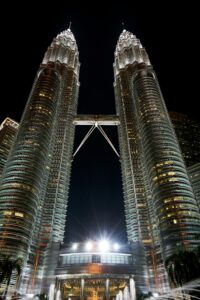 Stunning night shot of the iconic Petronas Twin Towers in Kuala Lumpur, Malaysia.